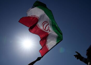 Iran officials announcing continued commitment to the Iran nuclear treaty